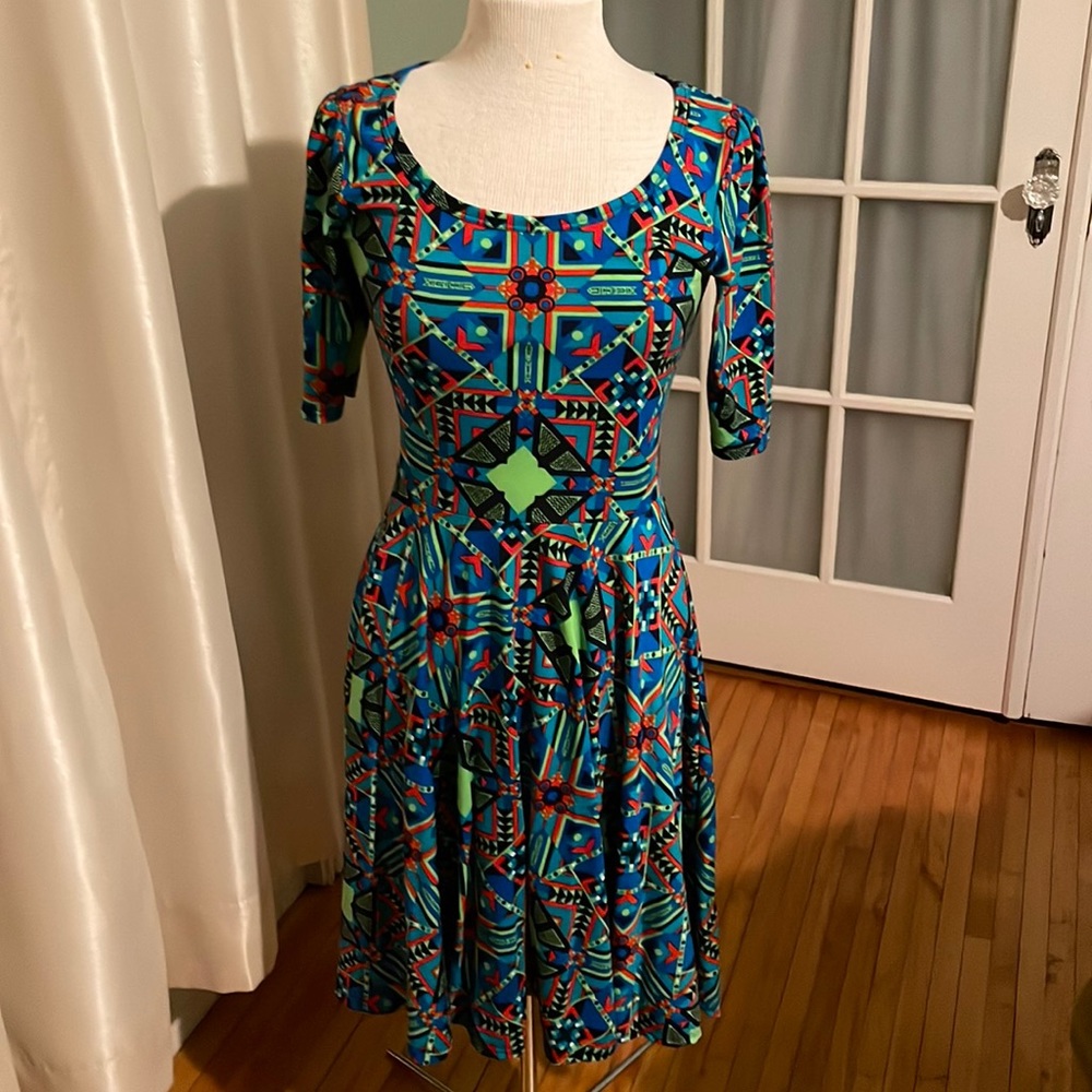 LuLaRoe Nicole Dress. Size Small. Green with navy blue geometric pattern.